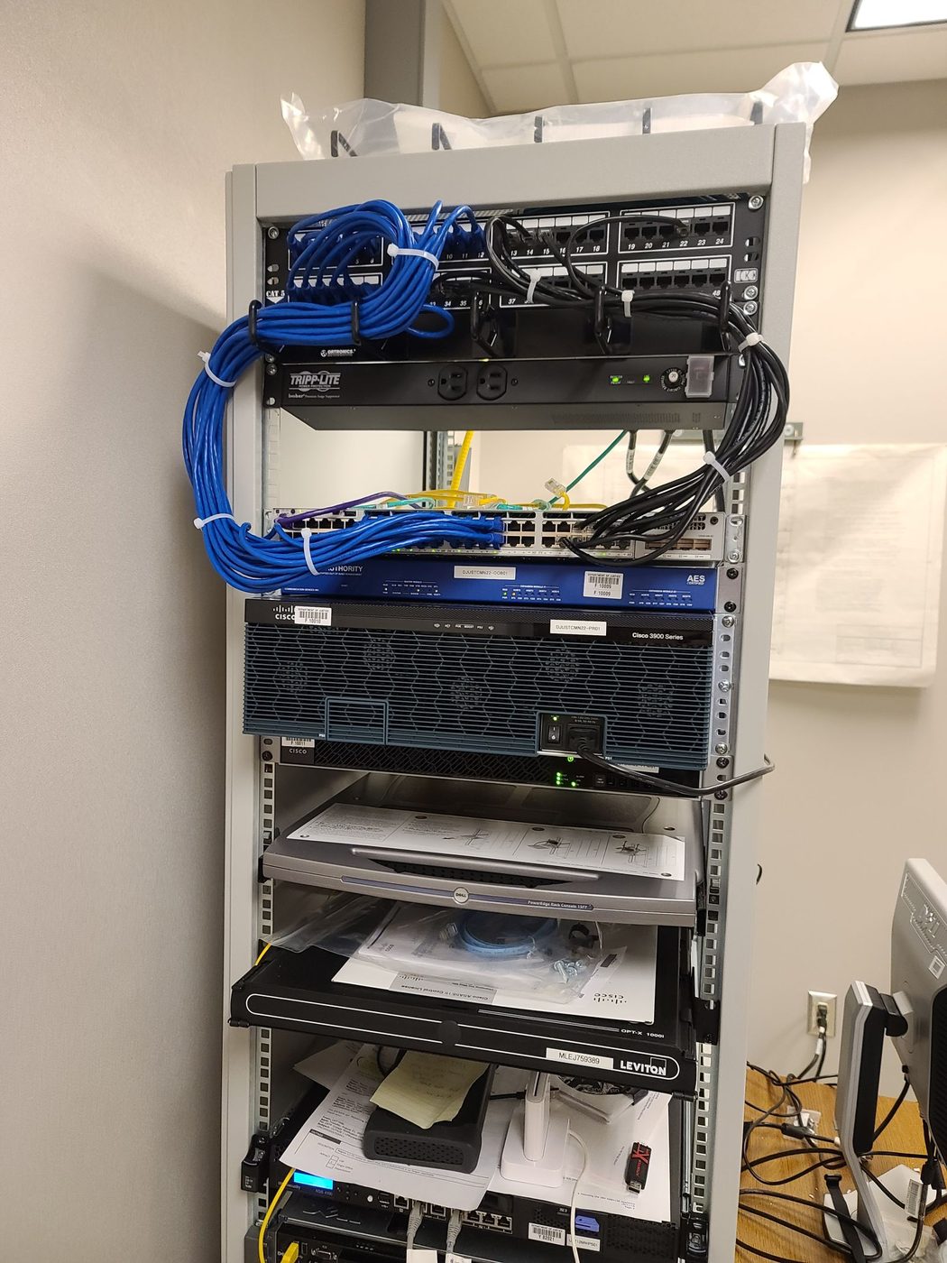 Structured network rack with patch panels and switching